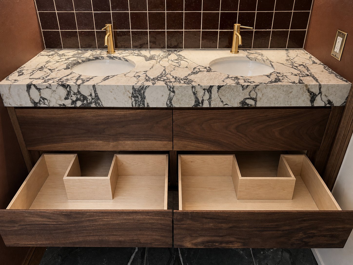 Open walnut vanity drawers with custom under-sink organizers