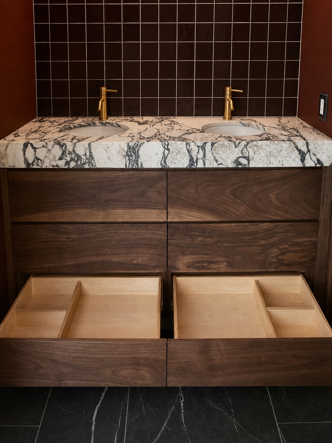 Custom drawer compartments beneath a black walnut vanity